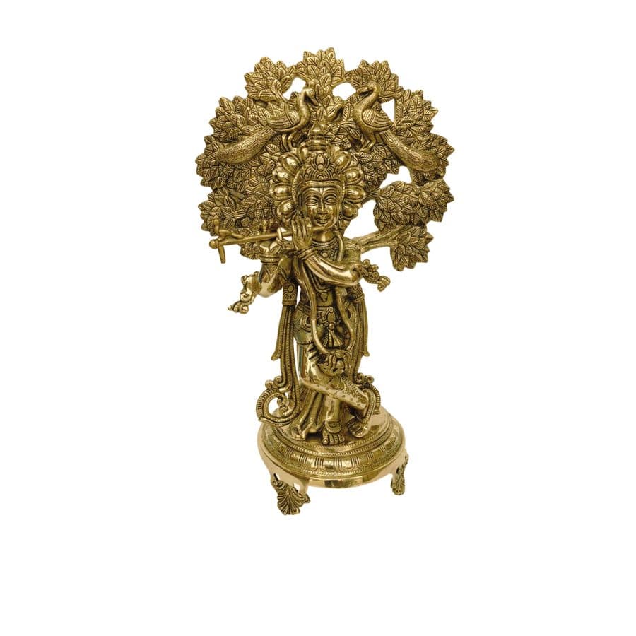 Krishna statue with tree