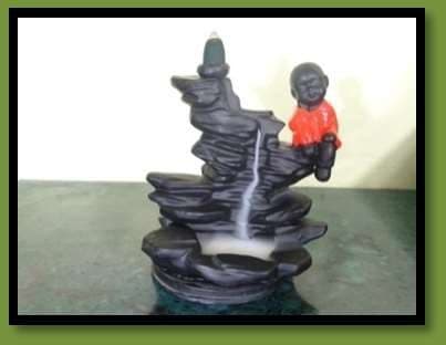 Baby on Stone Back Flow Smoke Fountain With Cones